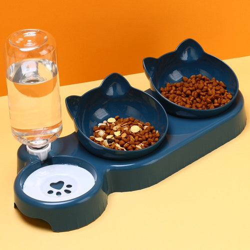 Plastic double bowl pet feeder with cat-shaped bowls and attached water dispenser on orange background