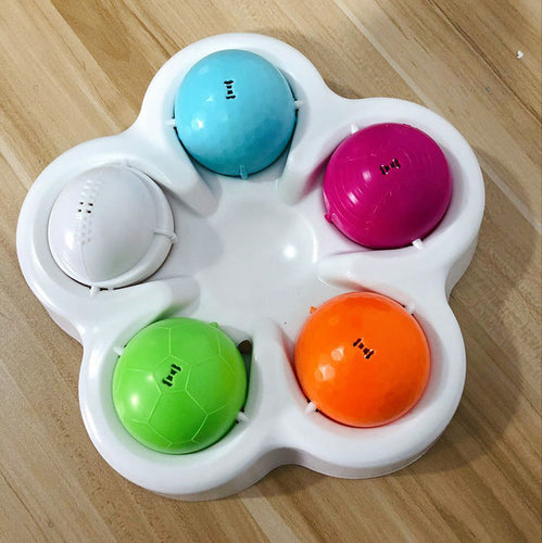Slow-feed and stimulate dog puzzle feeder with colorful balls for mental engagement and slower eating.