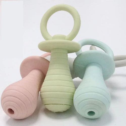 Pet pacifier rubber toys in green, pink, and blue for newborn dogs and cats chewing