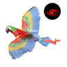 Colorful hanging cat toy shaped like a flying parrot with spinning wings and glowing red eyes to engage cats.