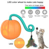 Electric cat pet toy shaped like a pumpkin with LED lights, vibrating sound, clap control, and colorful feathers for interactive play.