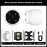 Pet tracker collar camera with white waterproof silicone cover, remote control, pet carrier, and charging cable accessories.