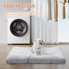 Luxury rose velvet round dog bed with ultra-plush fleece and orthopedic support for crates and floors, machine washable and non-slip.